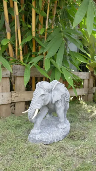 Product image 3 of the product “Nandi - Small Elephant bending to the right, 45cm L | cast stone ”